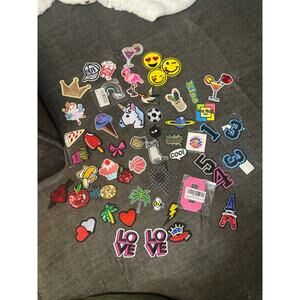 Patches Iron or sew on 52 assortment plus 2 stick ons.  Mostly small craft size